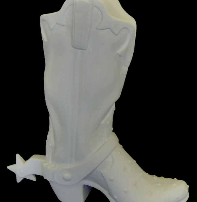 White fiberglass western cowboy boot sculpture facing right, with spur and studded detail.