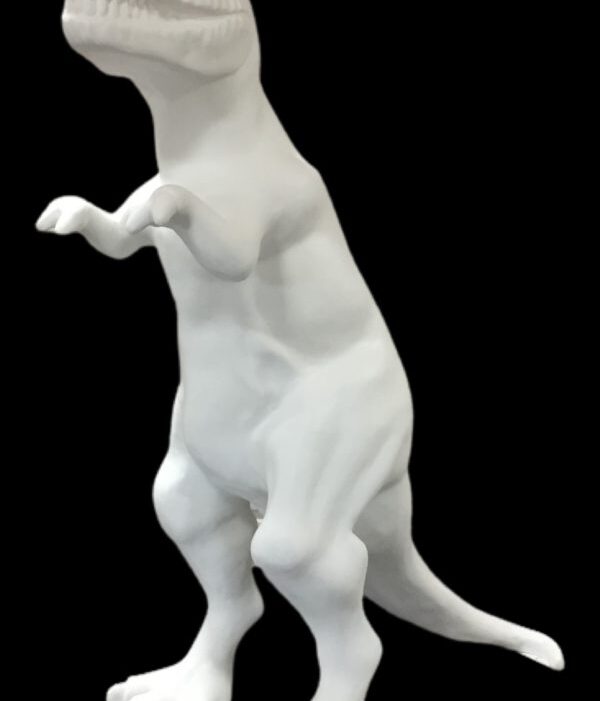 Fiberglass sculpture of a standing T-Rex with detailed teeth and claws, set against a black background.